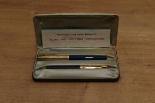 A boxed Parker 51 aerometric fill fountain pen in Teal with Rolled Gold converging line cap. Circa