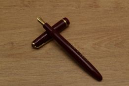 A Parker Victory Mk V aerometric fill fountain pen in red with narrow decorative cap band having