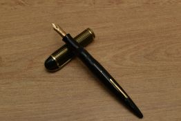 A Eversharp Skyline Slim lever fill fountain pen in Olive stripe with single cap band having