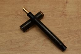A Parker Duofold Senior button fill fountain pen in BHR with single cap band having Parker USA 9
