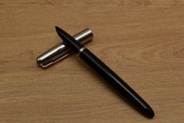 A Parker 51 Aerometric fill fountain pen in Black with a lustraloy cap. Circa 1948. Engraved