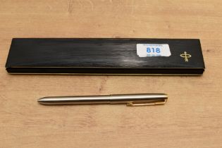 A boxed Parker Four Colour Ballpoint pen in Stainless Steel. Circa 1989