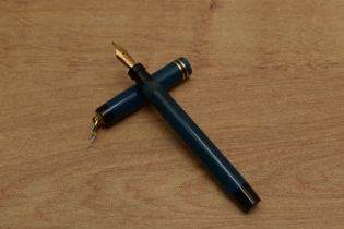 A Parker Pastel streamlined button fill fountain pen in Blue Moire with two band ring cap having