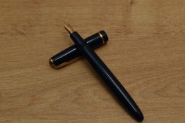 A Parker Duofold Junior aerometric fill fountain pen in Blue with a decorative cap band having