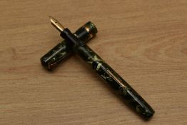 A Mabie Todd & Co Swan lever fill fountain pen in Green Marble with single cap band having Swan