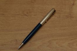 A Parker 51 Aero clutch pencil in Cedar Blue with Rolled Silver converging line cap with Gold