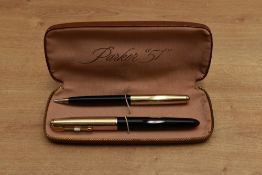 A boxed Parker 51 Aerometric fill fountain pen and clutch pencil in Black with rolled gold