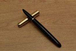 A Parker 51 aerometric fill fountain pen in Black with Rolled Gold converging line cap. Circa 1960