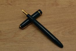 A Parker Duofold Slimfold aerometric fill fountain pen in Green with decorative cap band having