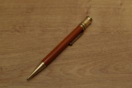 A Parker Duofold Senior Flat Top pencil in Red. Circa 1927. Slight ding