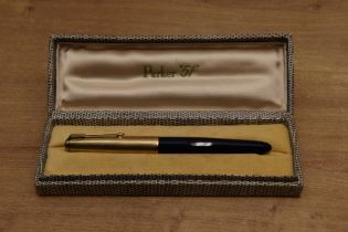 A boxed Parker 51 vacumatic fill fountain pen in Cedar Blue with Rolled Gold converging line cap.