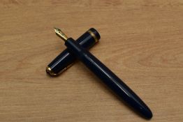 A Parker Duofold aerometric fill fountain pen in Blue with broad decorative cap band having Parker