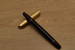 An Aurora 88 vacuum fill fountain pen in Black with gold fill cap. Circa 1944. Small ding to cap