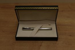 A boxed Montegrappa 1912 converter fill fountain pen in plain 925 sterling silver having Montegrappa