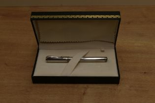 A boxed Montegrappa 1912 converter fill fountain pen in plain 925 sterling silver having Montegrappa