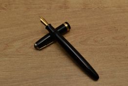 A Parker Duofold button fill fountain pen in Black with broad decorative cap band having Parker