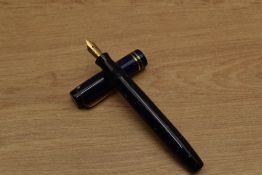 A Parker Junior Duofold streamlined button fill fountain pen in Lapis Lazuli with two cap bands