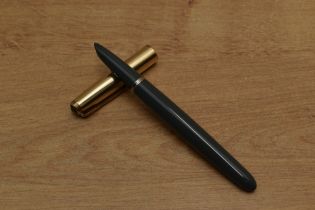 A Parker 51 aerometric fill fountain pen in Navy Grey with Rolled Gold cap. Circa 1959. Some rubbing