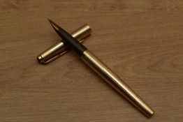 A Parker Falcon Imperial cartridge fill fountain pen in four line gold fill. Circa 1985