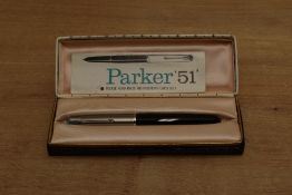 A boxed Parker 51 aerometric fill fountain pen in Black with a lustraloy cap. Circa 1955. Engraved