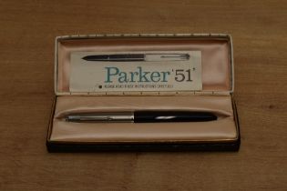 A boxed Parker 51 aerometric fill fountain pen in Black with a lustraloy cap. Circa 1955. Engraved