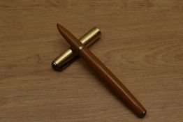A rare Parker 51 Vacumatic fill fountain pen in Mustard with gold filled twin jewel lined cap. Circa