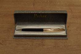 A boxed Parker 51 clutch pencil in Black with Rolled Gold converging line cap. Circa 1956