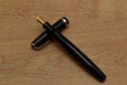 A Parker Duofold button fill fountain pen in Black with broad decorative cap band having Parker