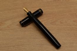 A Parker Duofold Junior Streamlined button filled fountain pen in Black with two cap bands having