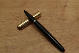 A Parker 51 Aerometric fill fountain pen in Forest Green with rolled gold converging line cap. Circa
