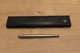A boxed Parker Falcon converter fill fountain pen in Brushed Stainless Steel. Circa 1985