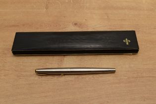 A boxed Parker Falcon converter fill fountain pen in Brushed Stainless Steel. Circa 1985