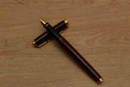 A Parker 75 converter fill fountain pen in Thuya Laque having Parker 14K 585 nib. Circa 1989