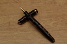 A Parker Duofold NS (new style) button fill fountain pen in Burgundy and Black marble with single