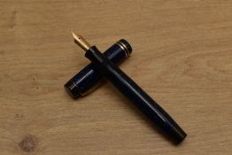 A Parker Junior streamlined button fill fountain pen in Lapis Lazuli with two cap bands having