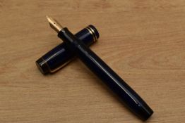 A Parker Duofold Senior streamlined button fill fountain pen in Lapis Lazuli with two narrow cap