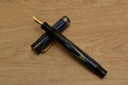 A Parker True Blue short button fill fountain pen with two bands to a Flat Top having Parker Lucky