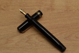 A Mabie Todd & Co Swan Leverless 1060 twist fill fountain pen in black with three narrow cap bands