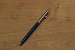 A Sheaffer S440 ballpoint pen in Blue with brushed steel cap and gold trim. Circa 1955.