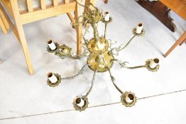 A vintage brass electrolier ceiling light fitting (8 branches)