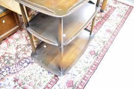 A dark stain Ercol three tier tea trolley, approx. 72 x 44cm