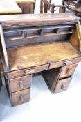 An early 20th Century miniature roll top desk, either made for child or as a specimen piece, width