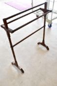 A Victorian mahogany towel rail having turned frame, width approx. 75cm