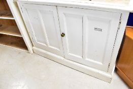 A Victorian painted pantry cupboard , in two sections , the top shelved section having had doors