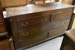 A period oak mule chest having lift lid over two faux drawers, one long drawer and three lower