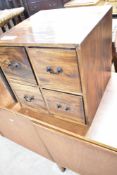 A modern hardwood cube set of four square drawers, in the merchants style, dimensions approx. 37 x