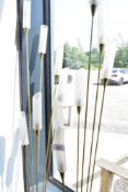 A pair of vintage brass standard lamps , of rush form