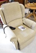 A Repose electric recliner chair , in beige, 2024 model