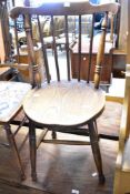 A Victorian oak spindle back kitchen chair