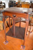 A late Victorian mahogany occasional table having shaped top , with Art Nouveau or Arts and Crafts
